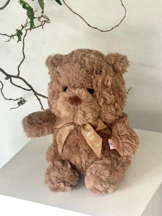Teddy bear with ribbon bow tie