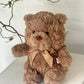 Teddy bear with ribbon bow tie